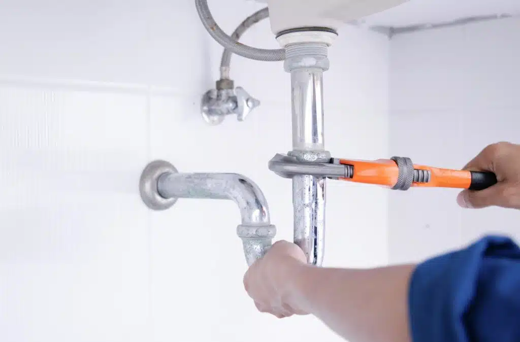 Licensed plumber performing code-compliant plumbing repair in Melbourne FL