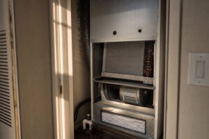 Galvanized supply plenum and air handler in a Florida attic where static pressure is measured